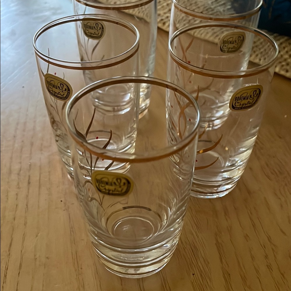 New small crystal glasses lot of 5. Measures 3 1/4 tall by 2 wide.